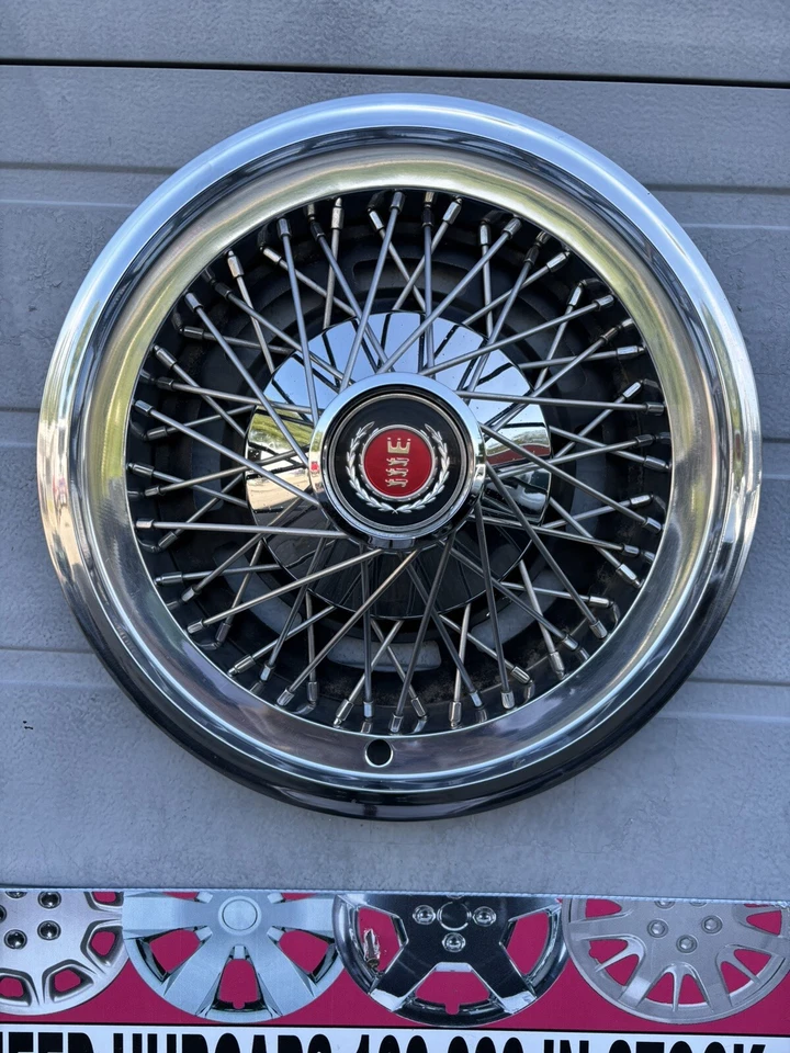 Ford Ltd Cougar Torino 1974-79 15” cable radificado OEM usado tapacubos Mercury Foto 2 de 4