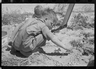 Photo:Caldwell Idaho 1941 FSA Labor Camp Farm Worker Son Child Photo