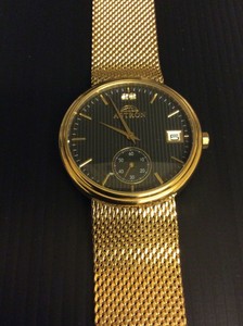 astron gold plated watch