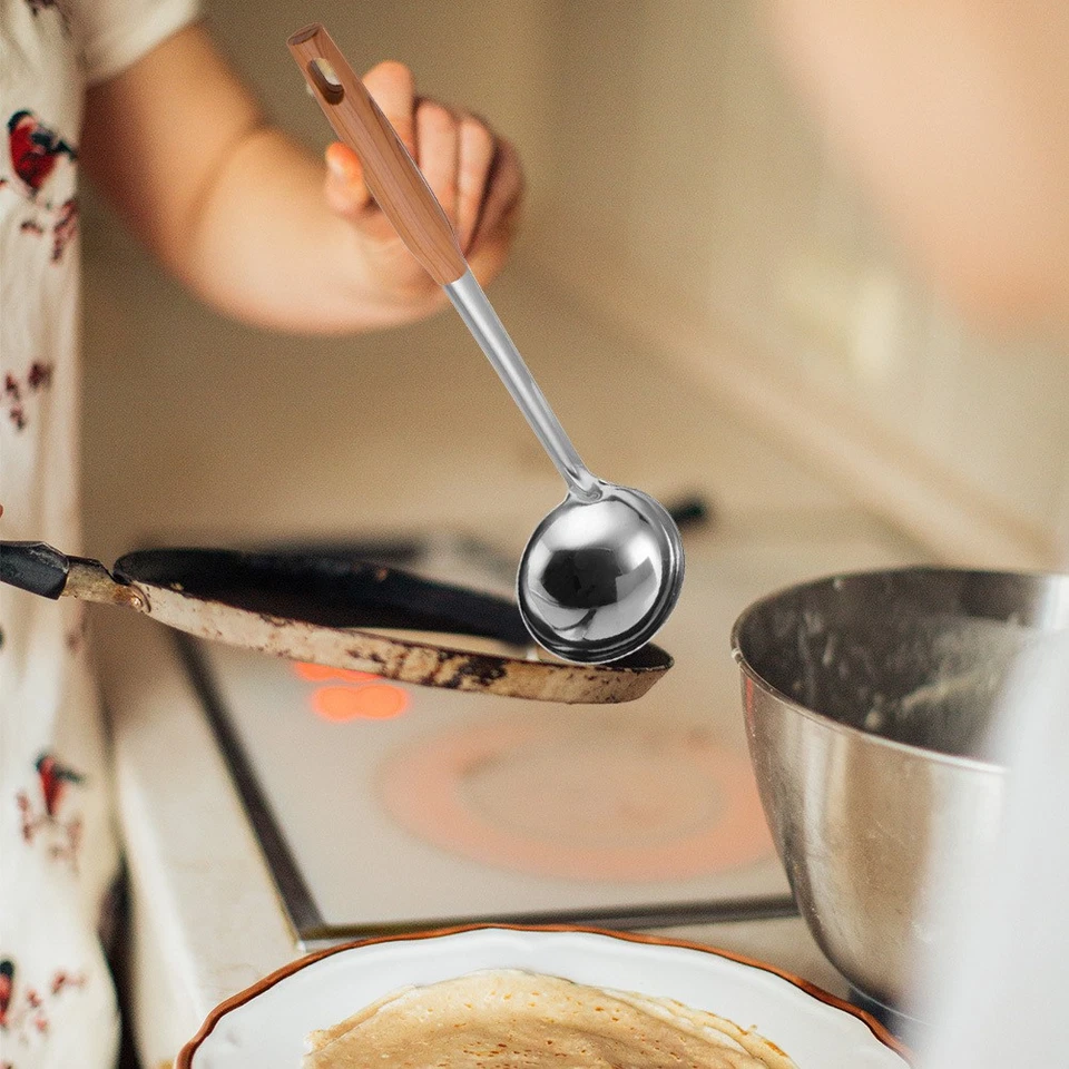 Spaiate in acciaio arrotondate in argento a manico lungo per casa - Immagine 2 di 4