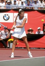 Monica Seles of Yugoslavia hits a return at a women's singles matc- Old Photo 36