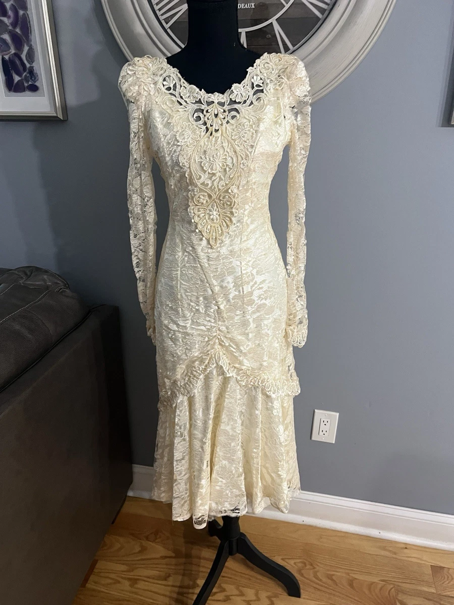 trumpet mermaid bateau long sleeves organza lace floor length dresses 2023 Trumpet Mermaid Long Sleeve Lace Ruffles Wedding Dress US4 / Ivory