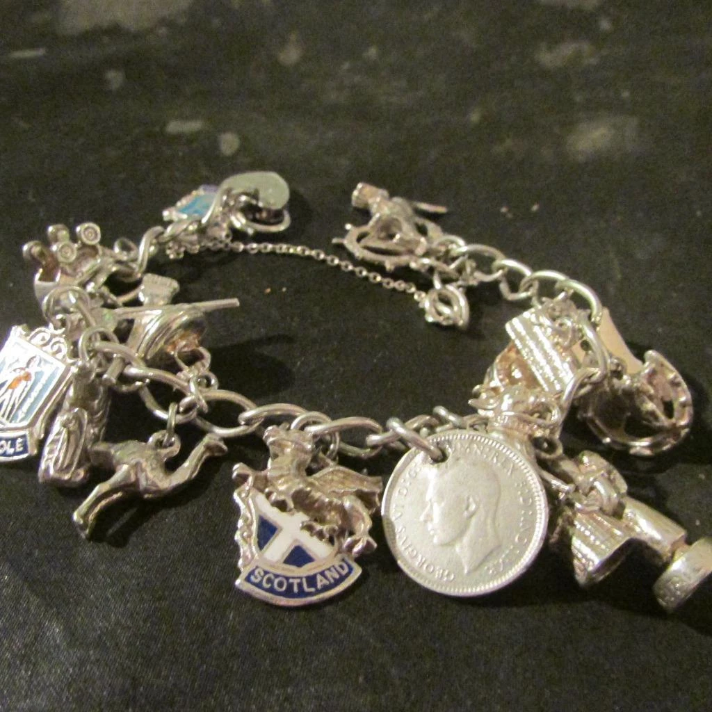 Solid silver charm bracelet deals