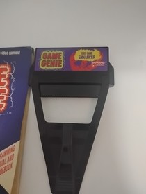 Nintendo NES Game Genie Game Enhancer Model 7356 w/ Cheat Codes Manual 