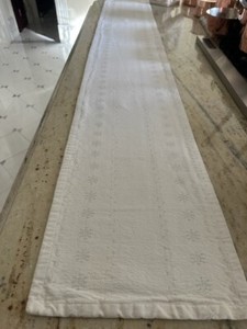 White 7' cloth table runner with silver embroidered  snowflakes, 13" width