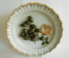 ANTIQUE FRENCH MOUSTIER ? FAIENCE TROMPE L'OEIL OLIVE DISH DECORATED WITH A ROSE