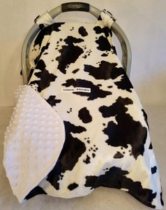 cow print car seat and stroller