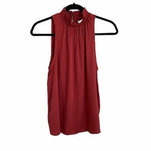 high neck ruffle sleeveless blouse