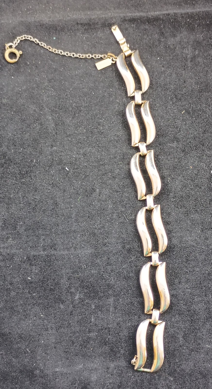 Vintage 7 inch Monet silver tone link bracelet with safety chain and Monet tag
