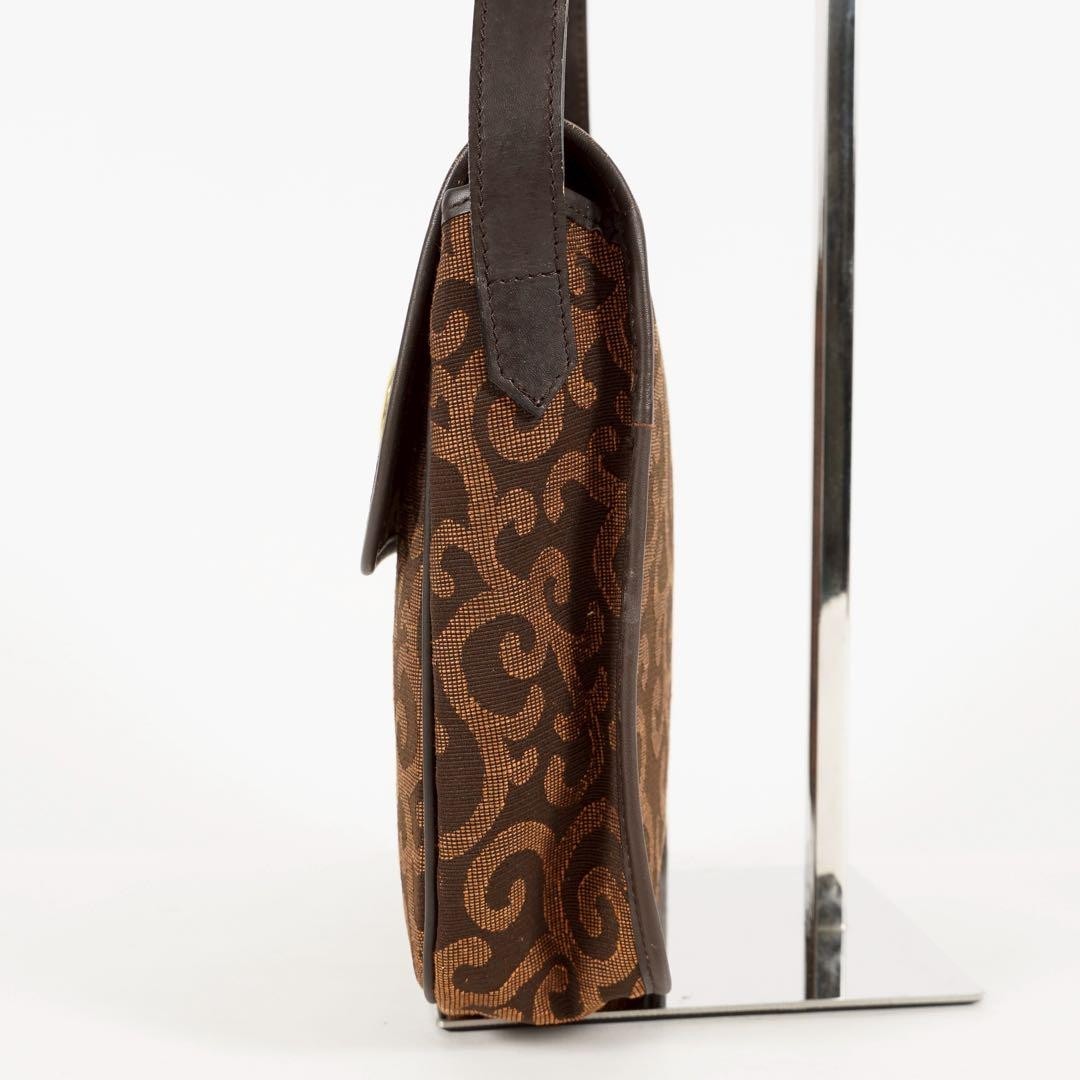 Borsa a tracolla YVES SAINT LAURENT a forma di cuore accessori in metallo arabesco donna