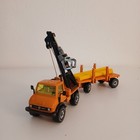 Siku 1:55 Unimog U406 mit Ladekran und Anhänger Rohrverleger orange, Siku 2820