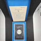 1884 CC $1 Morgan Silver Dollar - BU Carson City in case w/box and papper