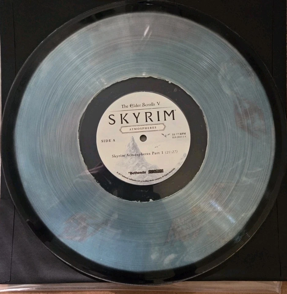 The Elder Scrolls V Skyrim Atmospheres LP Blue Glow Dust Filled Variant In Hand - Bild 4 von 4