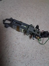 vintage 1965 1/32  scale diecast slot car chassis.