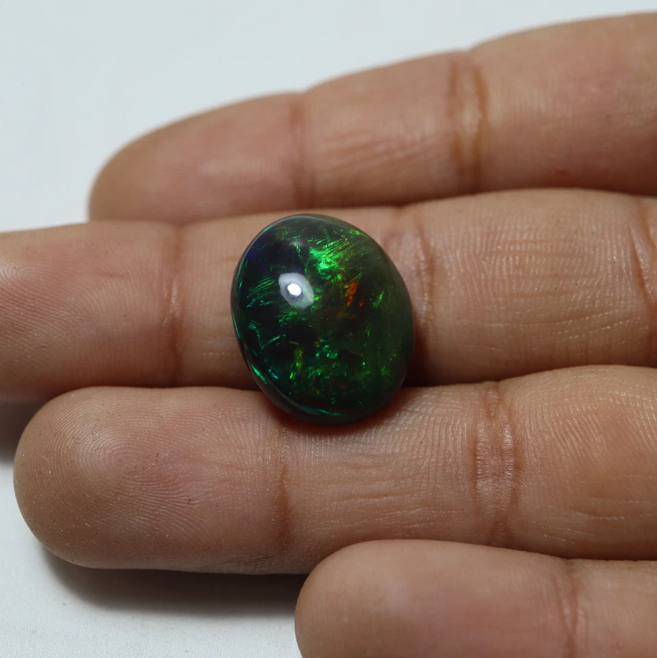 8,5 quilates 16,7 x 13,6 mm real AAA verde fuego ahumado negro ópalo etíope cabujón ovalado Foto 3 de 4