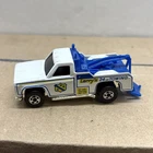 HOT WHEELS BLACK WALL WRECKER LARRY'S 24 HR TOWING TOW TRUCK
