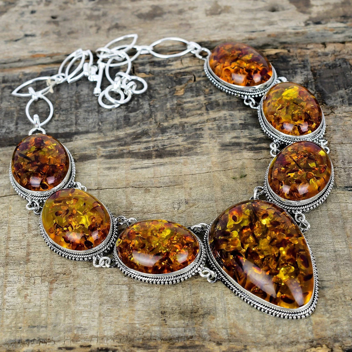 Collana con ciondolo in argento e ambra baltica Riccio