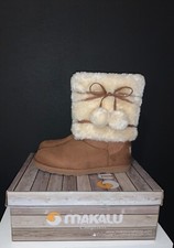 Chestnut and fur Makalu boots size 5 girls never worn and has barcode.