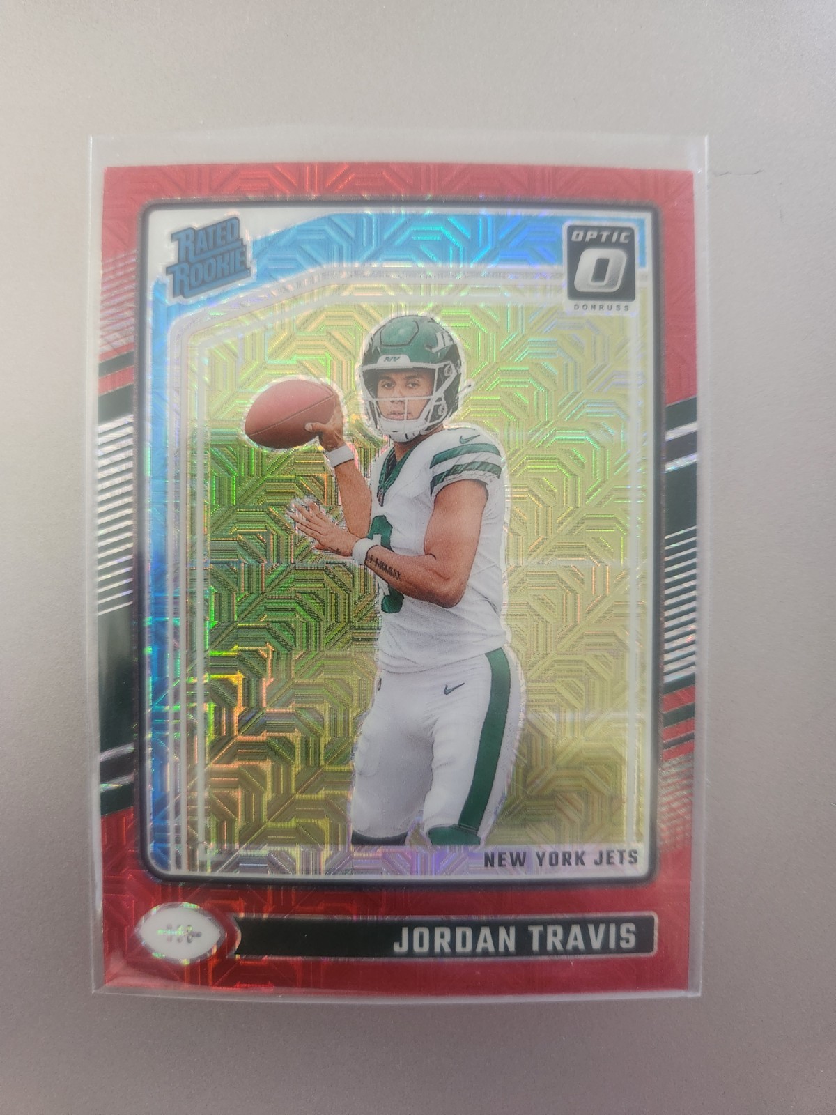 2024 Panini Donruss Optic Jordan Travis Red Mojo Prizm Rated Rookie #260