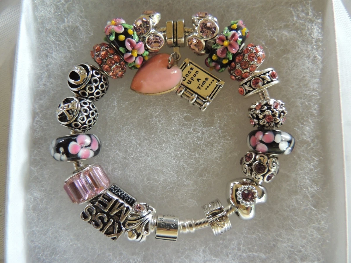 Pandora Bracelet With Pink and Rose Gold Character Themed Charms 