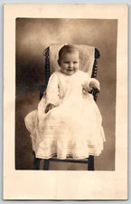 Postcard RPPC Real Photo Little Girl In Chair Very Cute Pose Identified On Back