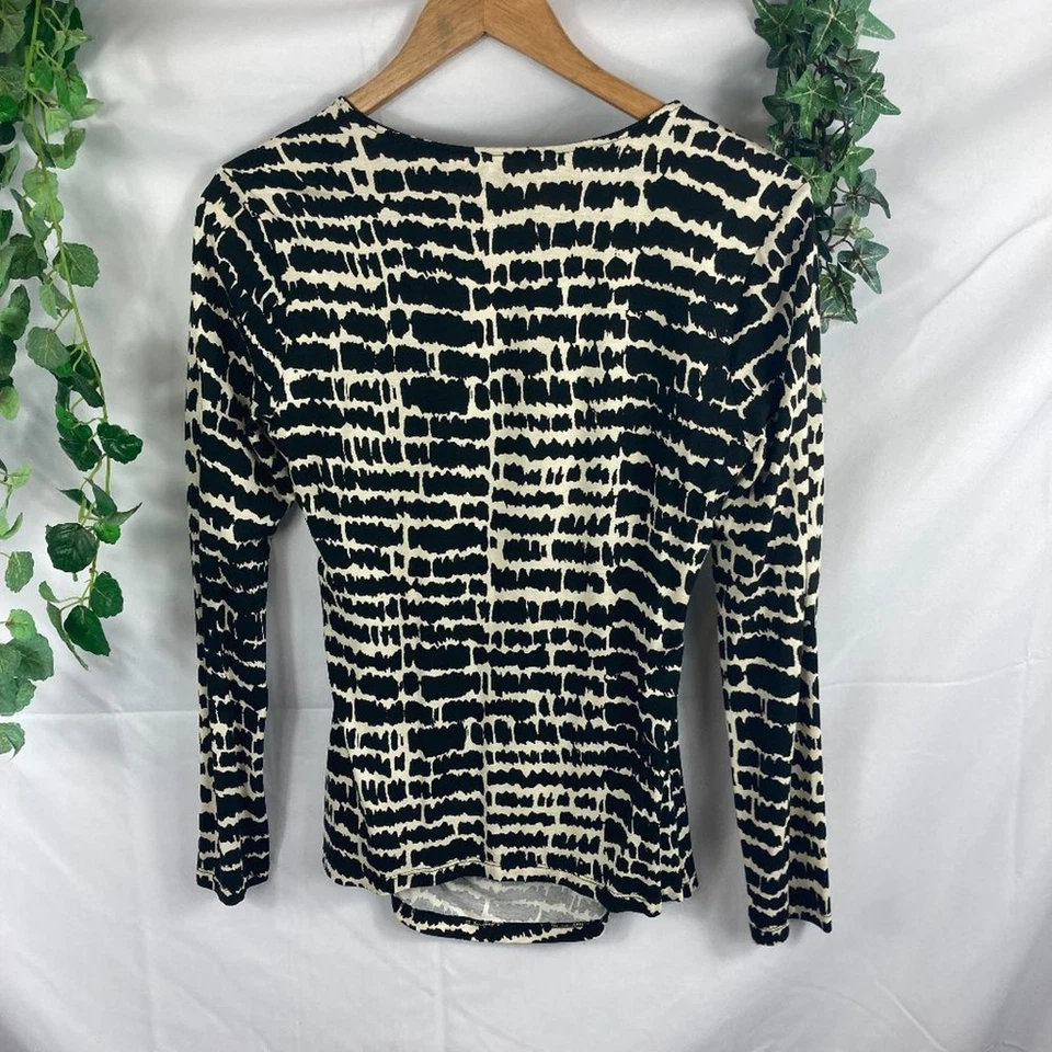 Top estampado animal delantero envolvente tres puntos S Foto 4 de 4