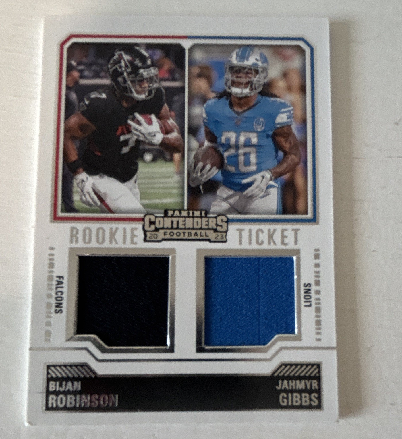 Panini 2023 Contenders Rookie Ticket Dual Swatches DS-8 Robinson/Gibbs RC MEM