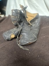 Antique Victorian-era high-top leather baby booties
