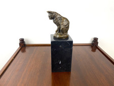 Bronze Sculpture of a Sitting Cat on a black marble base after Milo