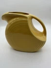 Fiesta ware Sunflower or Yellow Large Disk Pitcher EUC 7.5" tall