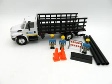 NEW Open Box DG Production ALLIANT ENERGY  Stake Body Truck w/ Figures