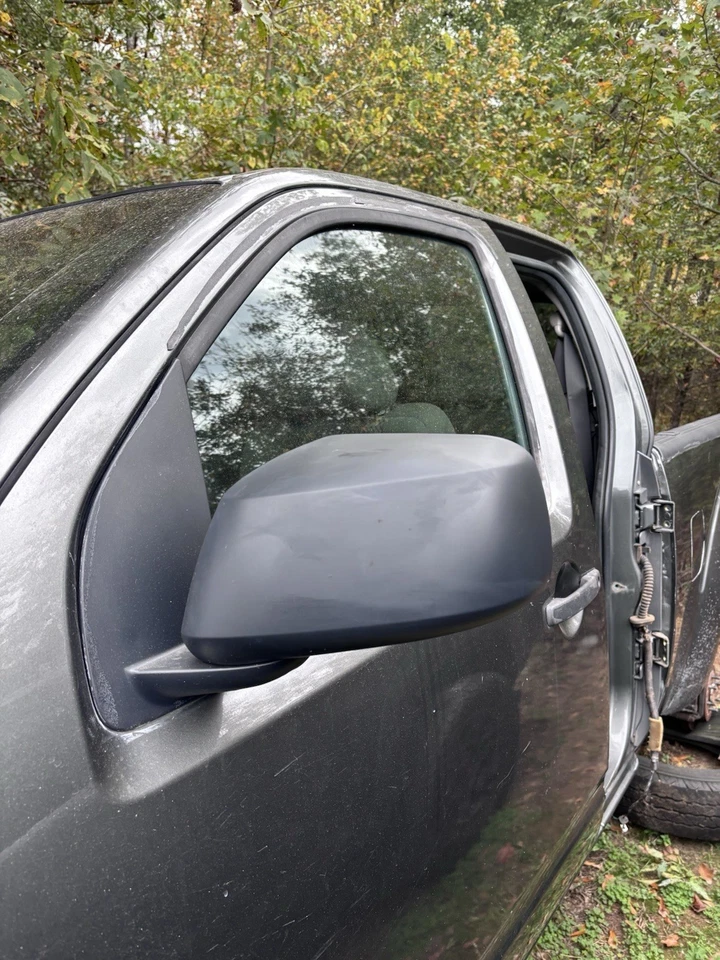 Espejo retrovisor lateral izquierdo Nissan Frontier 2005-2012 OEM usado Foto 2 de 2