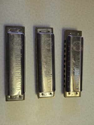 Variety Of Hohner Harmonicas With A Lee Oskar Key Of E