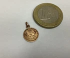 Beautiful religious pendant in gold, chalice