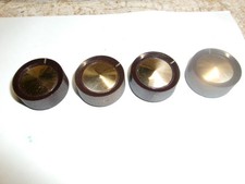4 VINTAGE BROWN PLASTIC CONTROL KNOBS WITH BRASS CENTERS