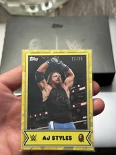 2025 Topps WWE x BAPE #12 AJ Styles Yellow Camo Foil /99