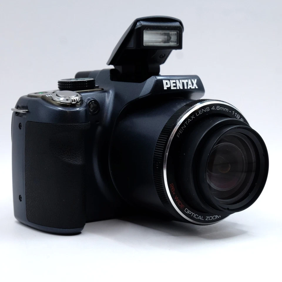 Cargador lente zoom óptico 26x cámara puente digital sensor CCD Pentax X90 12,1 MP Foto 3 de 4