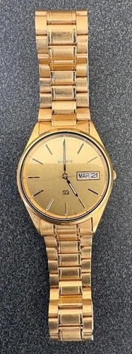 Vintage 1980's Seiko Quartz Gold Tone Men's Wristwatch with Day/Date