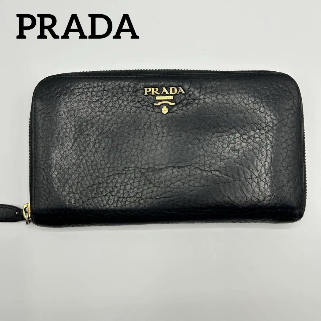 Prada Saffiano Leather Round Zipper Wallet with Gold Logo in Excellent Condition