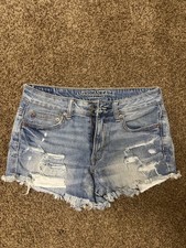 American Eagle Outfitters Festival Distressed Denim Shorts Size 4 Blue Raw Hem