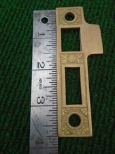 AGED BRASS FINISH EASTLAKE 3 3/4" PASSAGE DOOR STRIKEPLATE - STYLE #3   (33009)