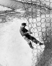 Lone workman works on the steel netting at the Mohne Dam Old Photo