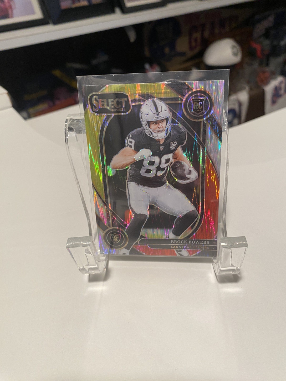 2024 Select Brock Bowers Rookie Card Red and Yellow Shock Prizm Club Level