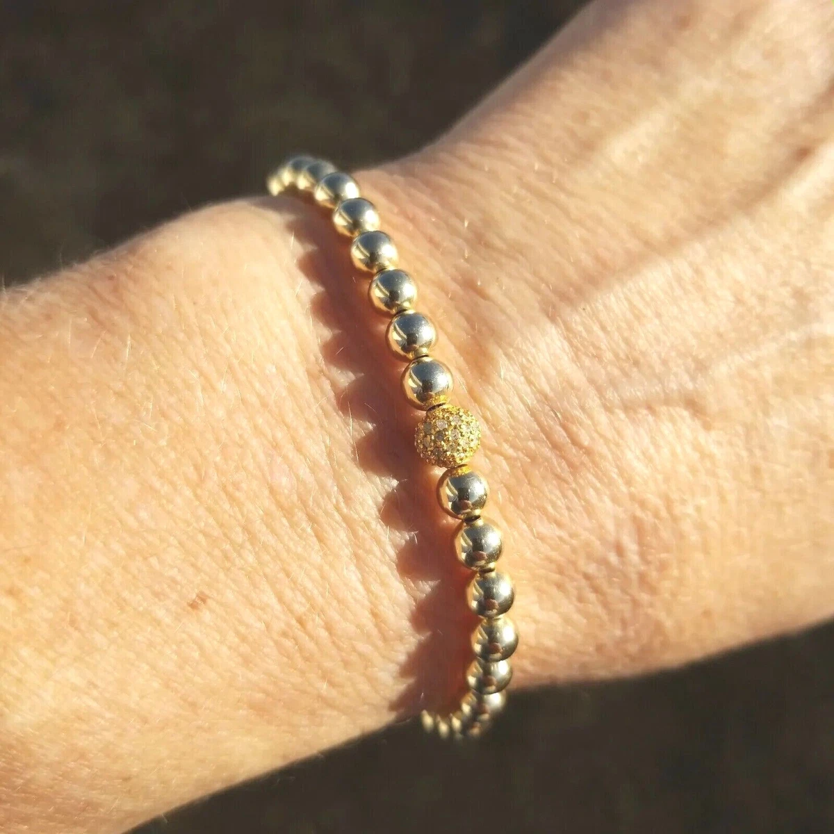 Gold ball outlet bead bracelet