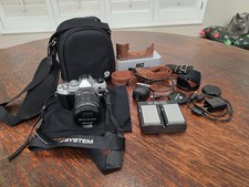 BARELY USED BUNDLE OM System OM-5 Mirrorless Camera 12-45mm f/4 PRO Lens