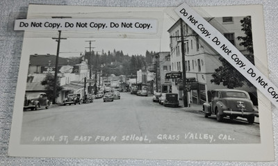 1940s Brett Harte Inn Cars Downtown Main St Grass Valley CA RPPC Postcard