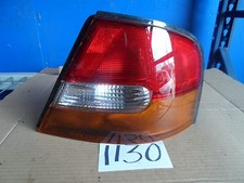 98 99 Nissan Altima PASSENGER Side tail light Used rear Lamp #1130
