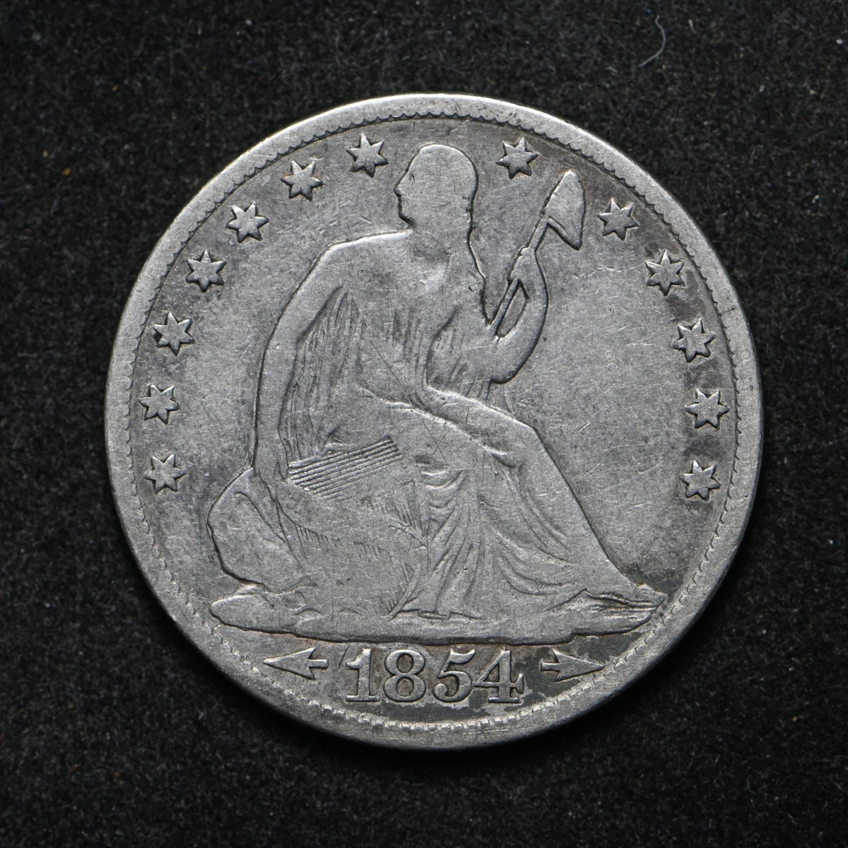 1854 Year Silver Seated Liberty US Half Dollars (1839-1891) for