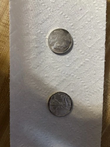 2011 American eagle (1) and 2014  Buffalo round (1) 2 oz of Silver toned.