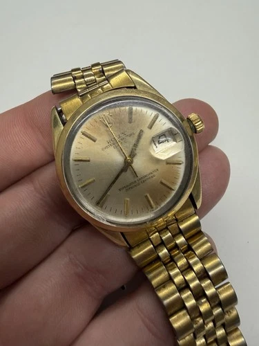 Vintage Rolex Oyster Perpetual date 14k Gold Automatic Watch